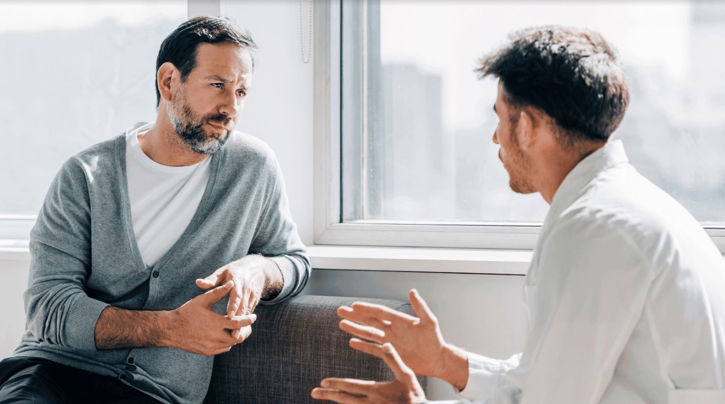 Counselor and patient involved in a therapy session