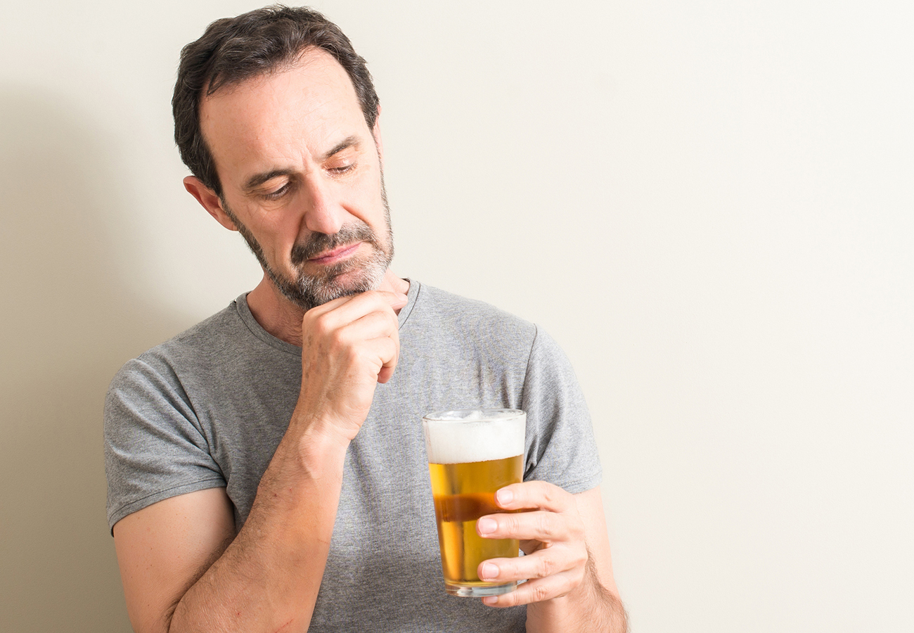 man drinking beer