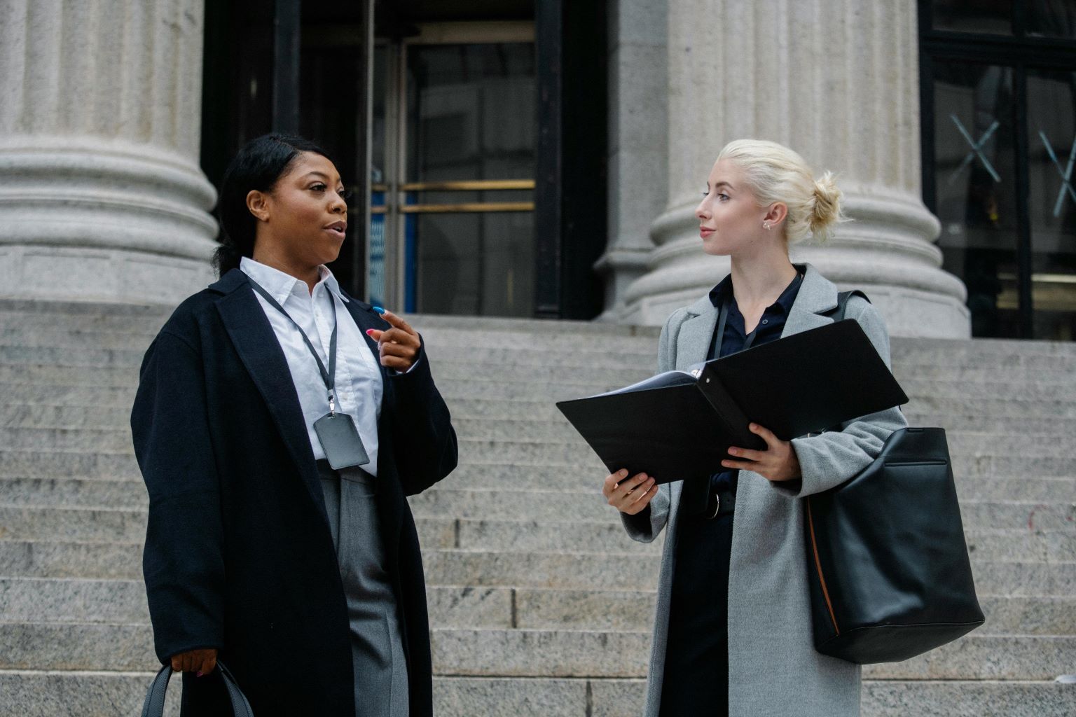 Lawyers talking outside of a court